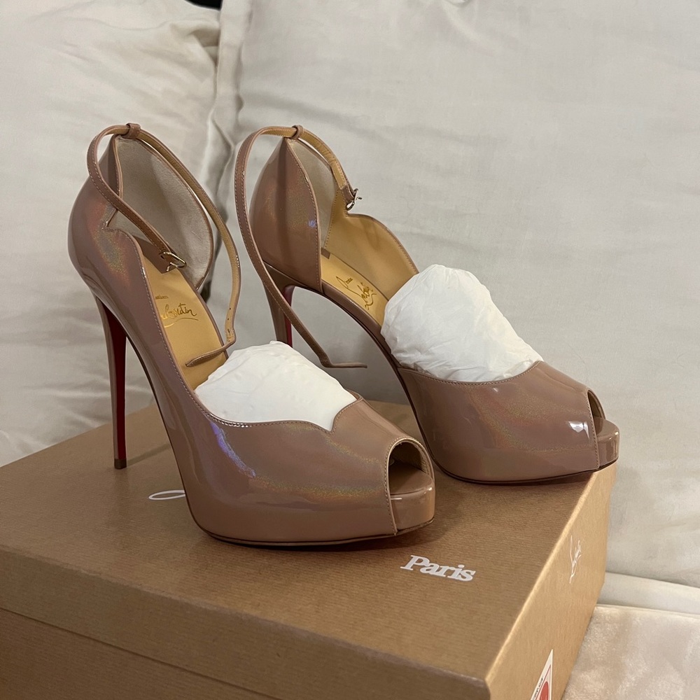 4.7 inch heel, nude. Never worn!